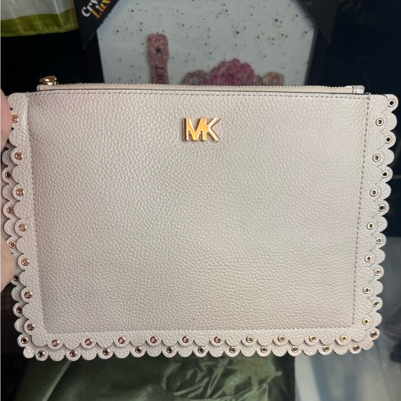Michael Kors Handbags - Michael Kors Scalloped Leather Zip Clutch – Blush Pink
New Without Tags